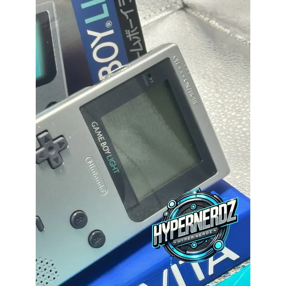 Sliver gameboy light in box! Amazing condition!
